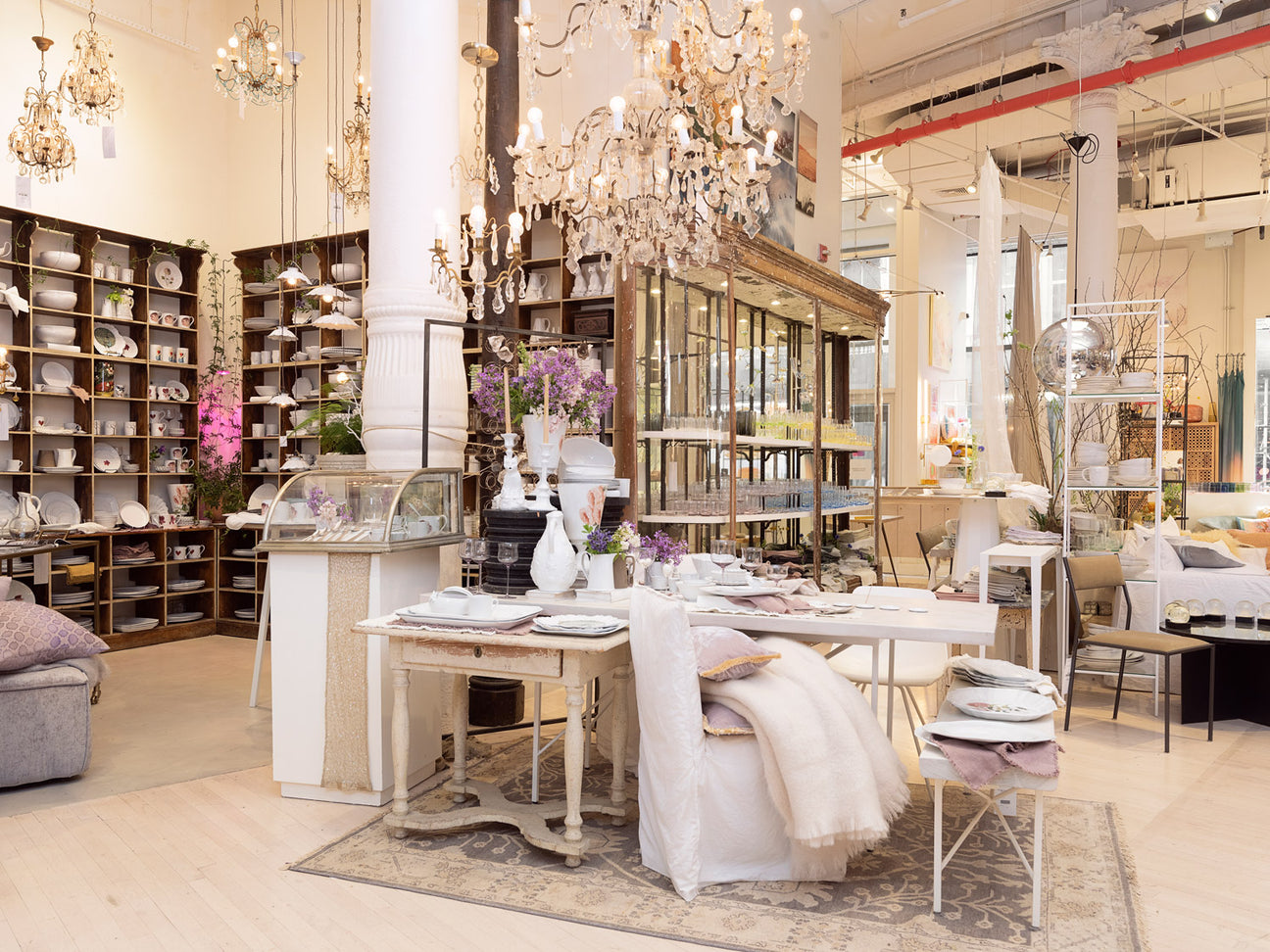 Elegantly arranged home decor store showcases luxurious furnishings and accessories.