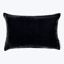 Plush, velvety rectangular pillow in dark color with clean edges.