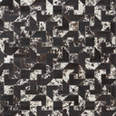 High-contrast geometric cowhide pattern with interlocking L shapes.