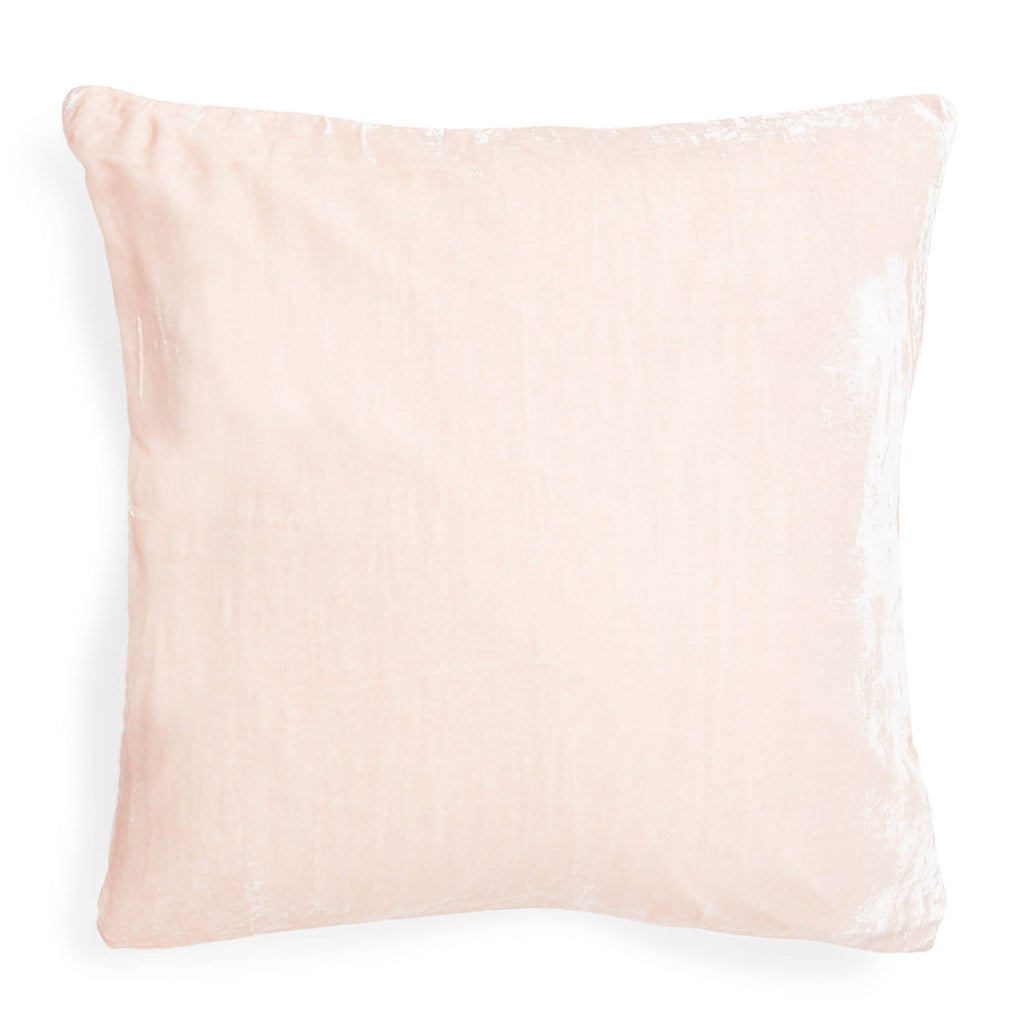 Soft, pale pink square pillow with crushed velvet texture.