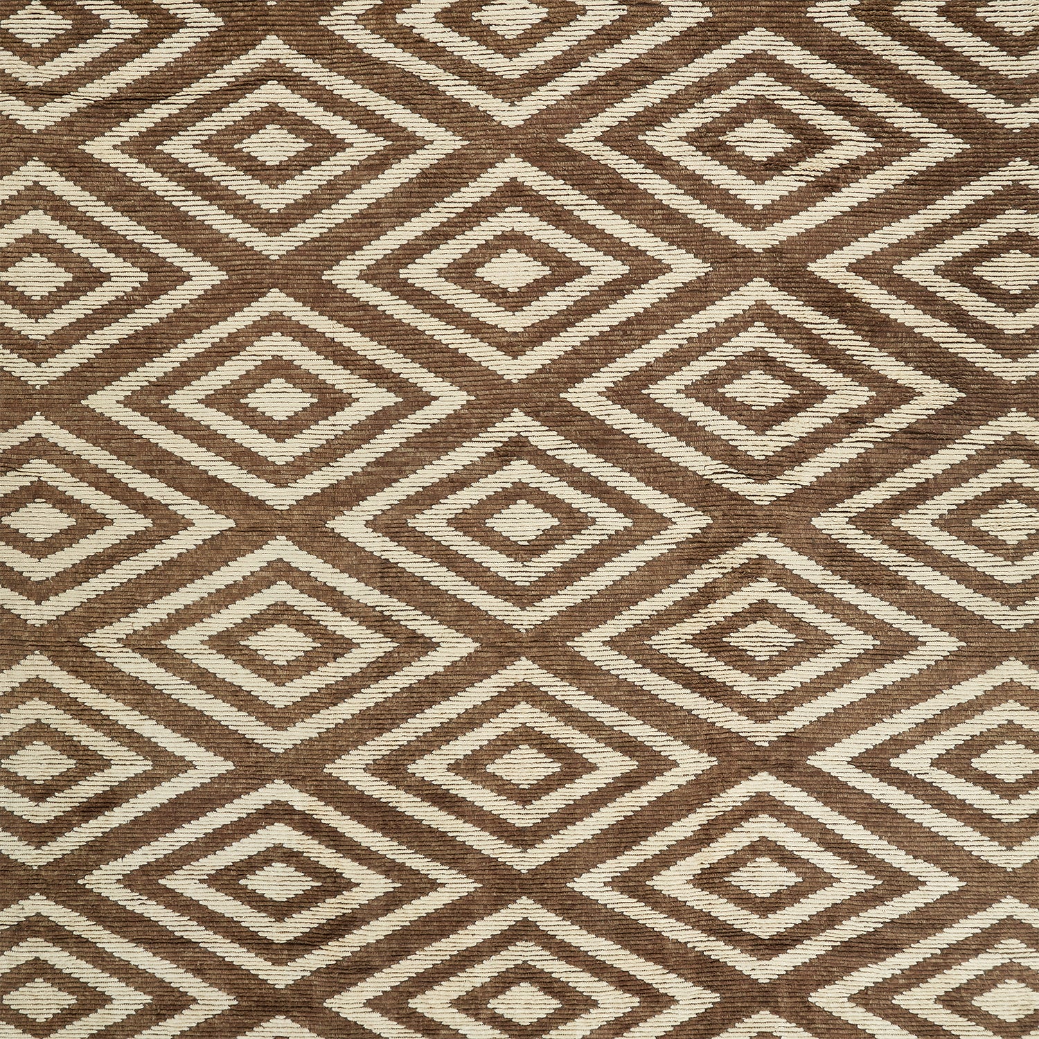 Textile with muted geometric pattern showcasing traditional and modern influences.