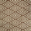 Textile with muted geometric pattern showcasing traditional and modern influences.