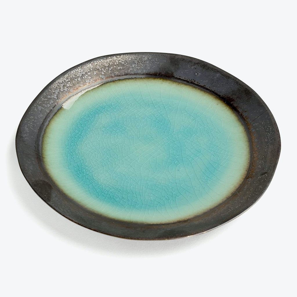 Handcrafted ceramic plate with crackle glaze finish in turquoise and brown.