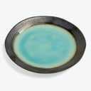 Handcrafted ceramic plate with crackle glaze finish in turquoise and brown.