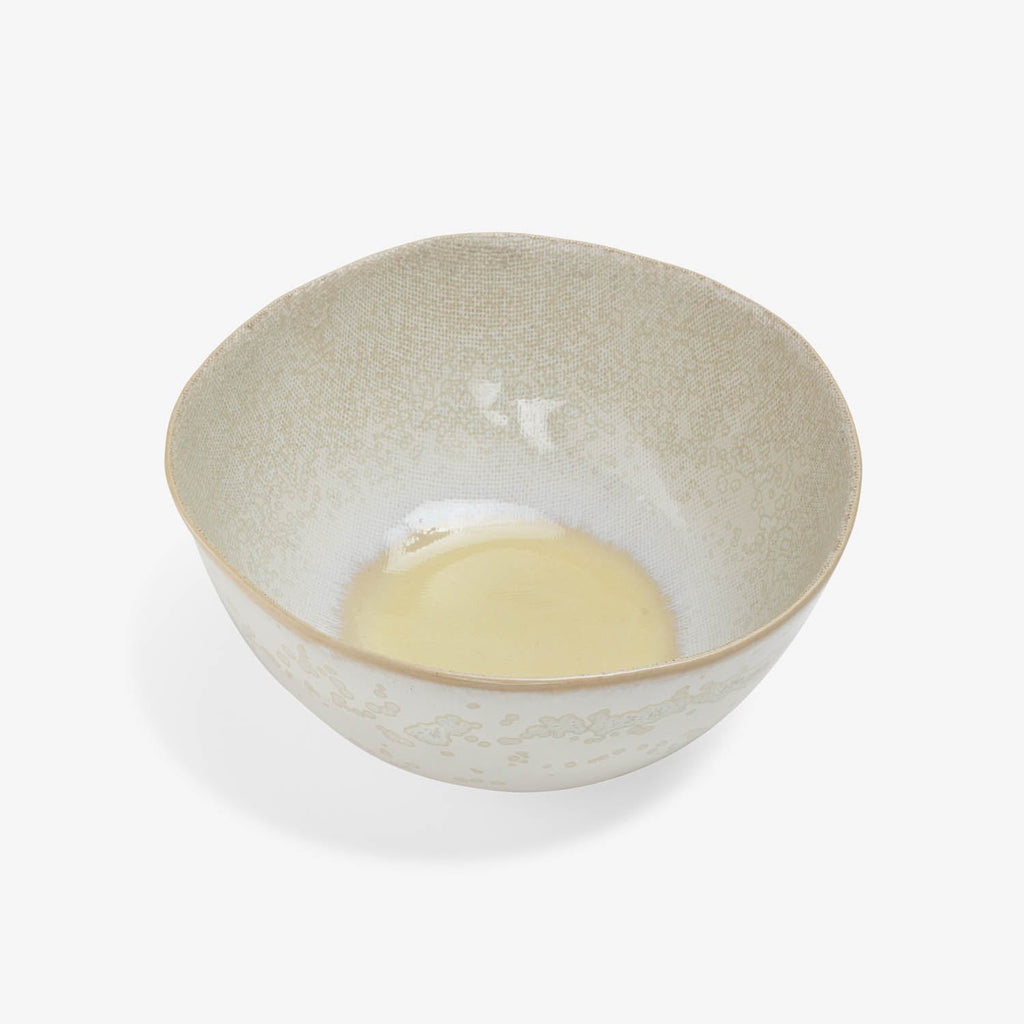 Medium-sized ceramic bowl with textured exterior and glossy interior.