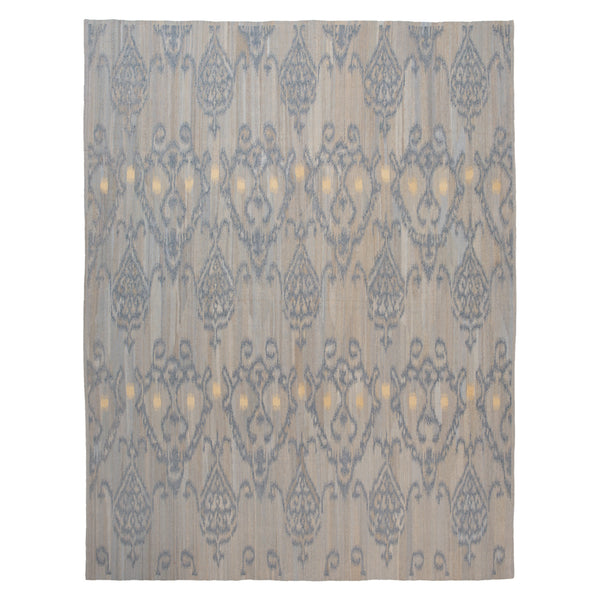 Ornate damask-style rug with floral motifs in beige and blue.