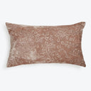 Elegant dusky pink pillow with raised floral pattern and sheen.