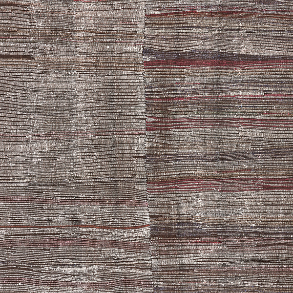 Intricate handwoven fabric with textured beige base and subtle highlights.