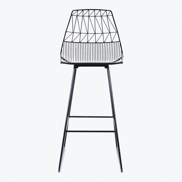 Modern-style bar stool with minimalist design showcases sleek wireframe silhouette.