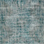 Close-up of distressed fabric resembling vintage weathered upholstery or carpet.