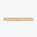 Long wooden plank with natural grain pattern on white background.