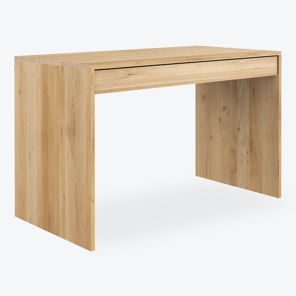 Minimalist wooden desk with clean lines and light wood color.