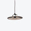 Industrial-style hanging light fixture with reflective silver interior and black exterior.