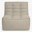 Contemporary fabric armchair featuring quilted backrest and plush seat.