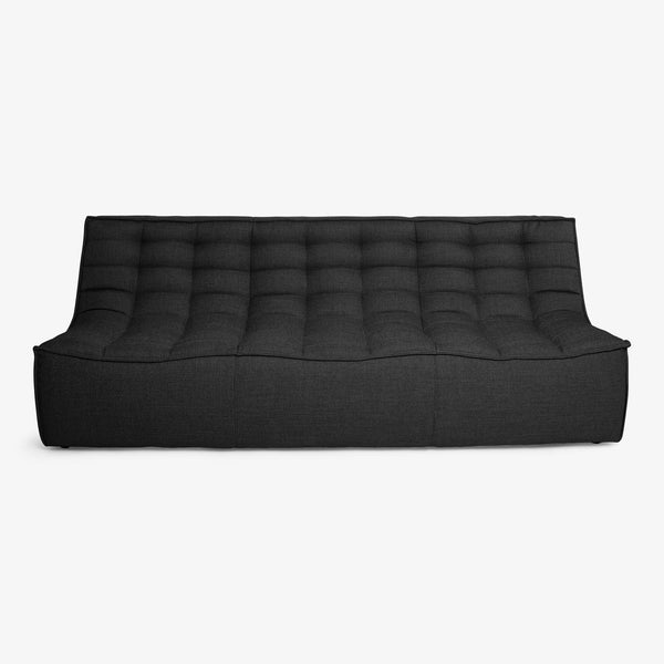 Sophisticated and modern black tufted sofa with minimalist design.