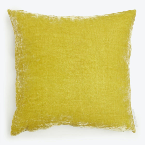 Vibrant yellow square pillow with plush texture and soft fabric.