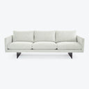 Contemporary minimalist sofa with clean lines and metal legs.