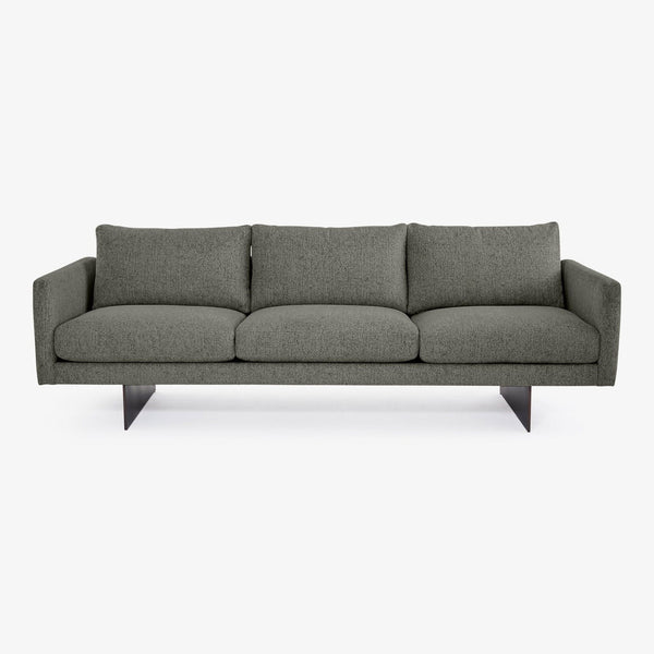 Contemporary gray sofa with clean lines and minimalist design.