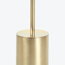 Close-up of a contemporary golden metallic base with brushed finish.