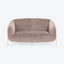 Minimalist modern sofa in blush-tone upholstery exudes elegance and comfort.