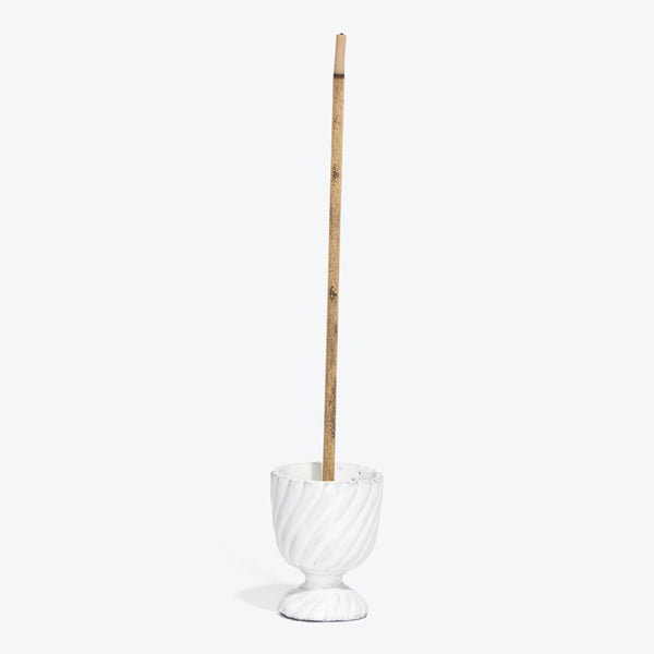 Contemporary toilet brush set with wooden handle and marble base.