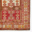 Exquisite traditional rug with geometric and floral motifs in rich colors.