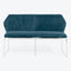 Modern minimalist sofa with deep blue velvet upholstery and chrome legs.