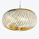 Contemporary pendant light with golden metal strips creates stunning patterns.