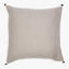 Square decorative pillow with off-white color and delicate woven pattern.