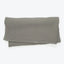 Rectangular grey pillow cover with waffle-like texture on white background.