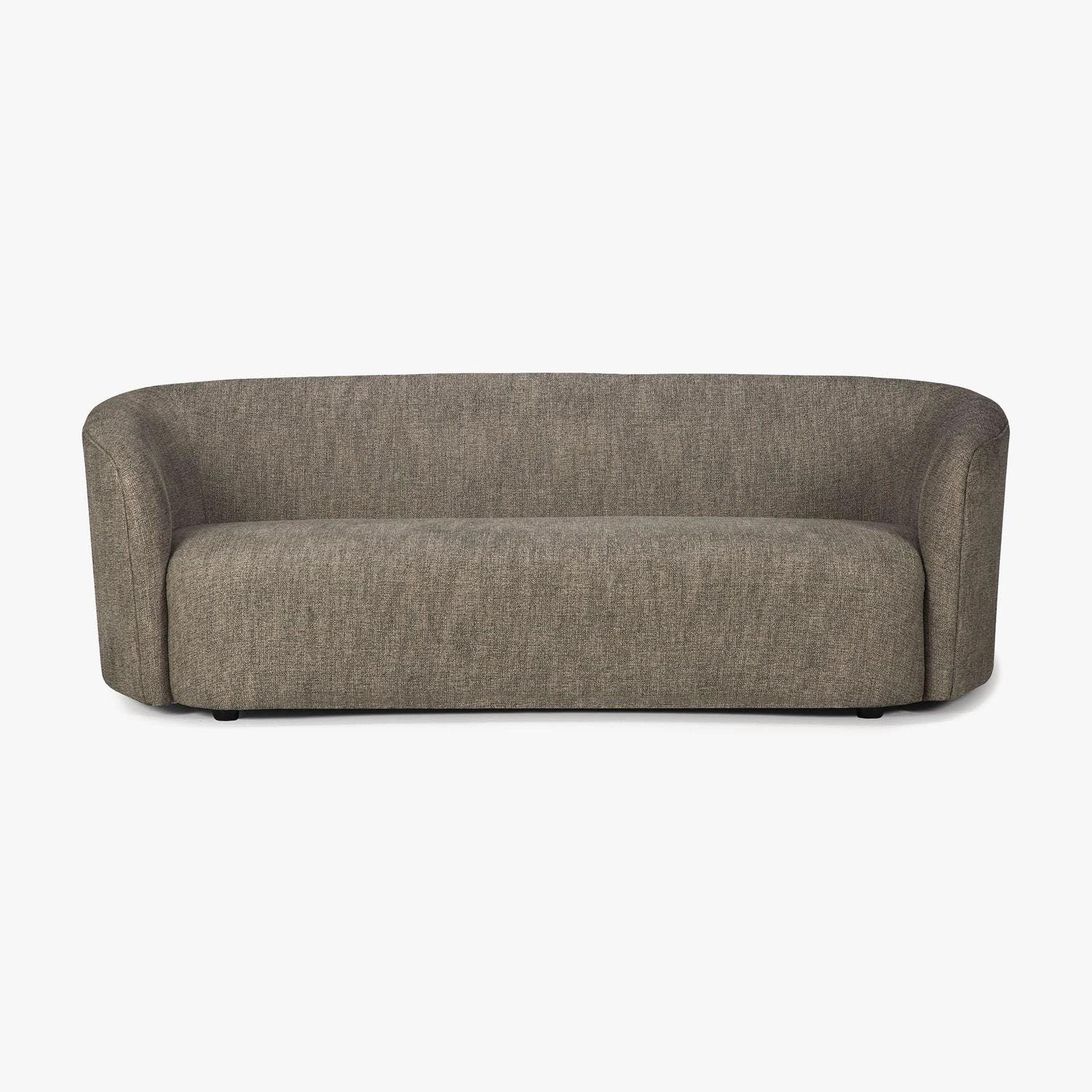 Modern curved sofa with neutral upholstery and minimalist silhouette.