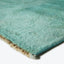 Luxurious teal rug with a plush texture, perfect for home.