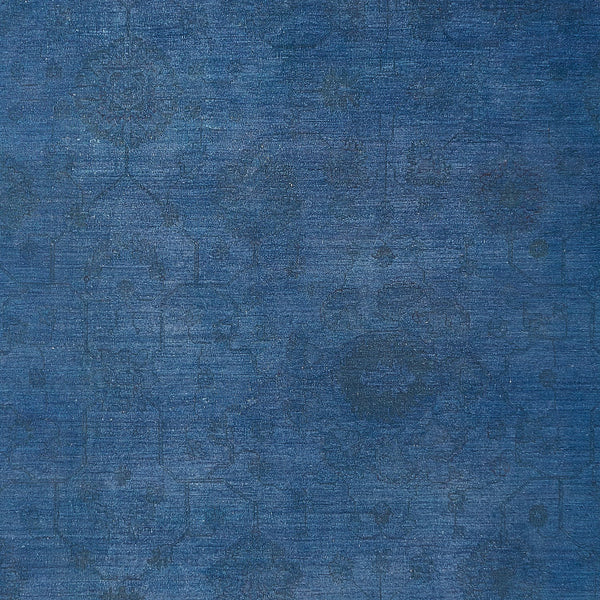 Abstract textured surface showcasing a vintage blue canvas with wear.