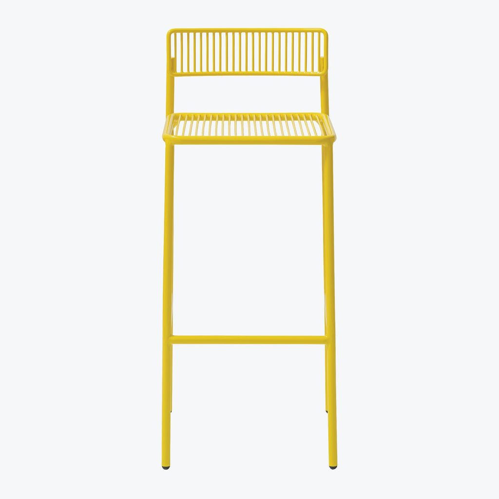 Minimalist yellow bar stool with sleek design and modern aesthetic.