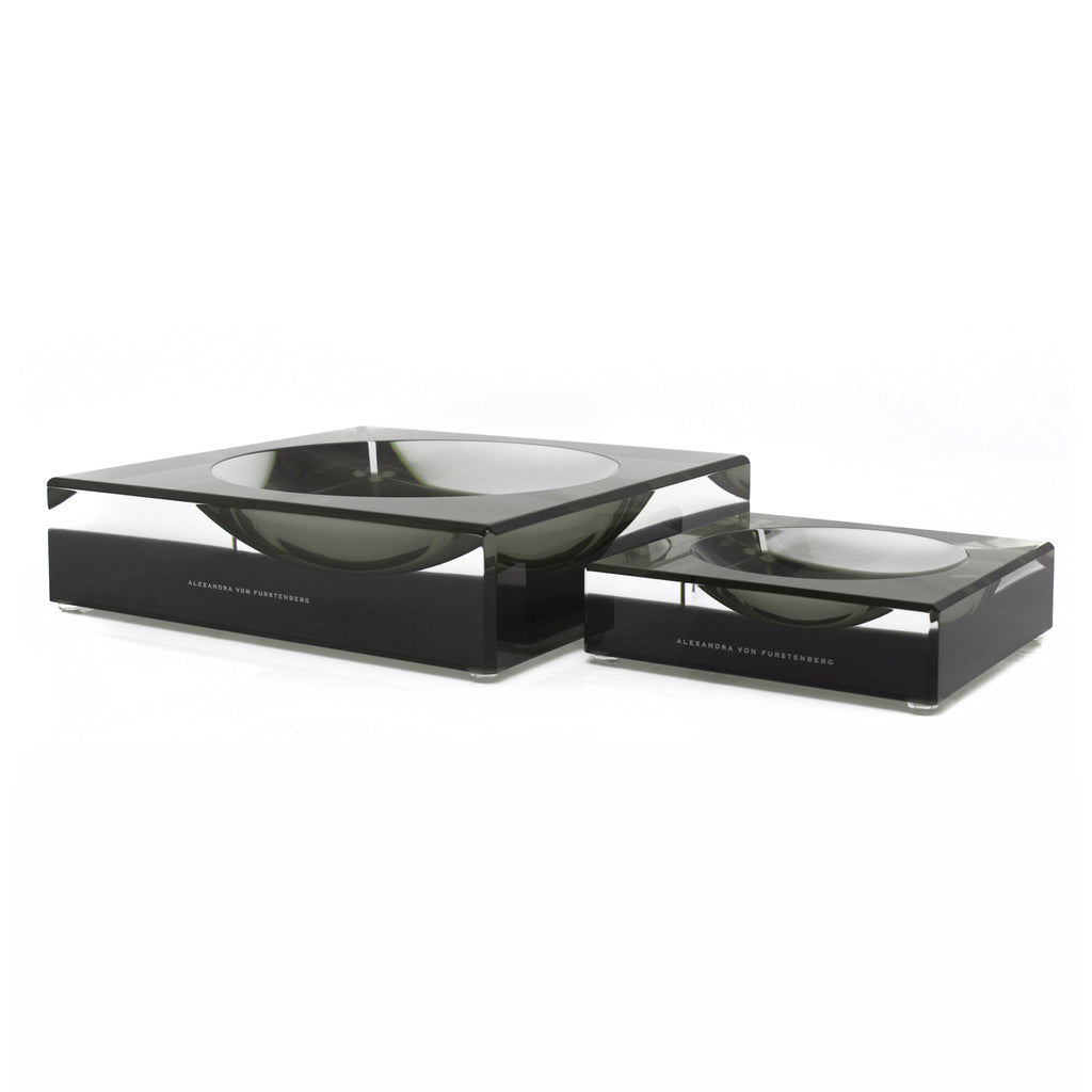Modern Alexandra Von Furstenberg trays with sleek, black design.