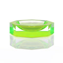 Striking neon green acrylic bowl with sleek design and reflective surface.