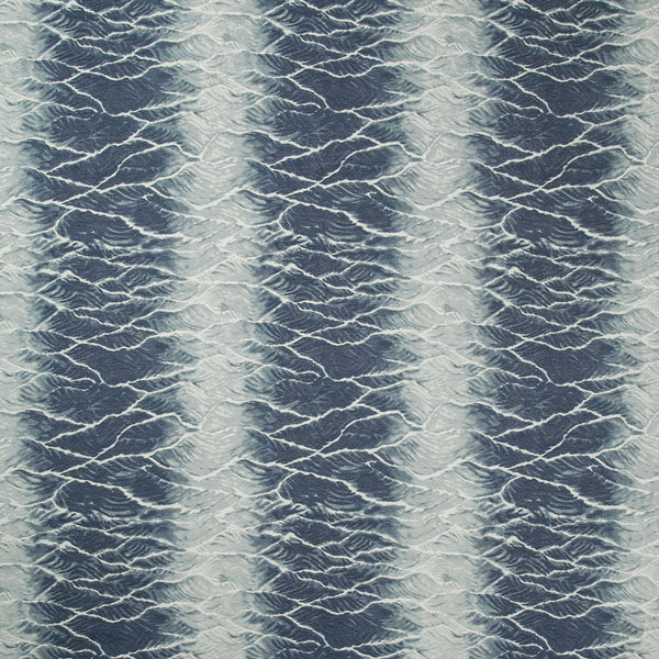 Abstract fabric design showcases ocean-inspired waves in soothing blue tones.