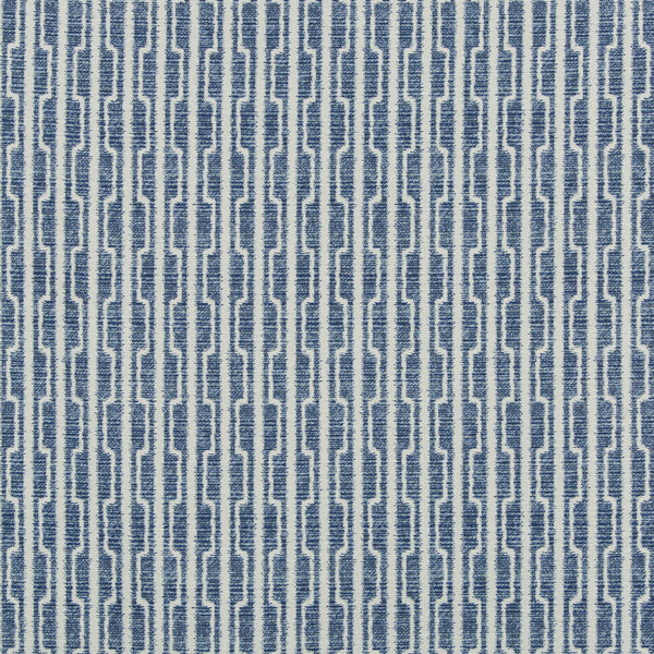 Close-up of fabric with textured geometric pattern in blue and white.