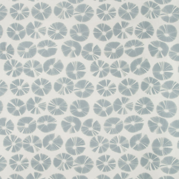 Stylish blue floral fabric pattern with abstract motifs on white.