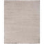 Soft and fluffy rectangular rug in a uniform light color.