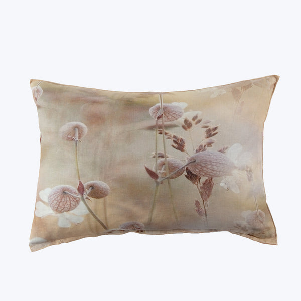 Rectangular decorative pillow with vintage floral print on white backdrop.