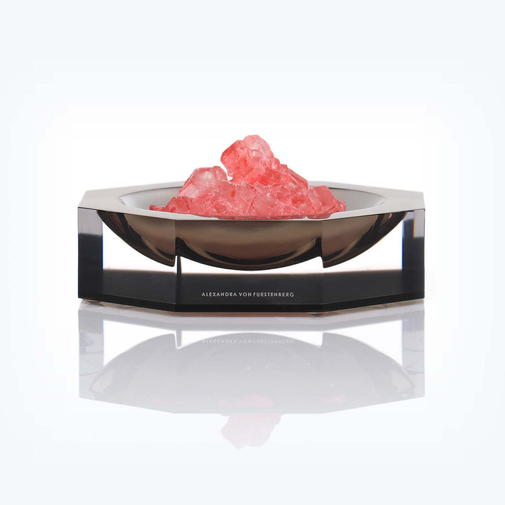 Modern decorative bowl with pink crystal-like objects designed by Alexandra Von Furstenberg.