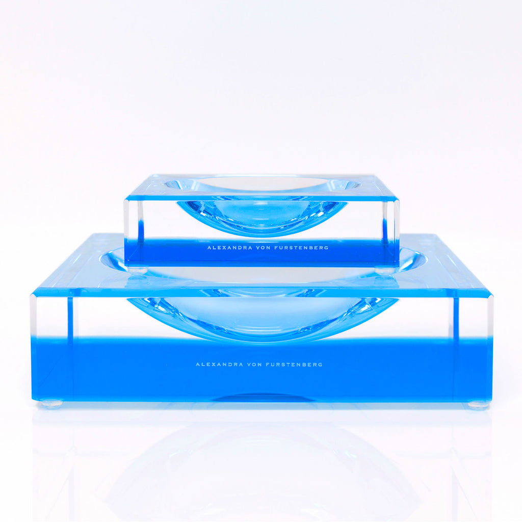 Modern acrylic table by Alexandra von Furstenberg showcases minimalist design.