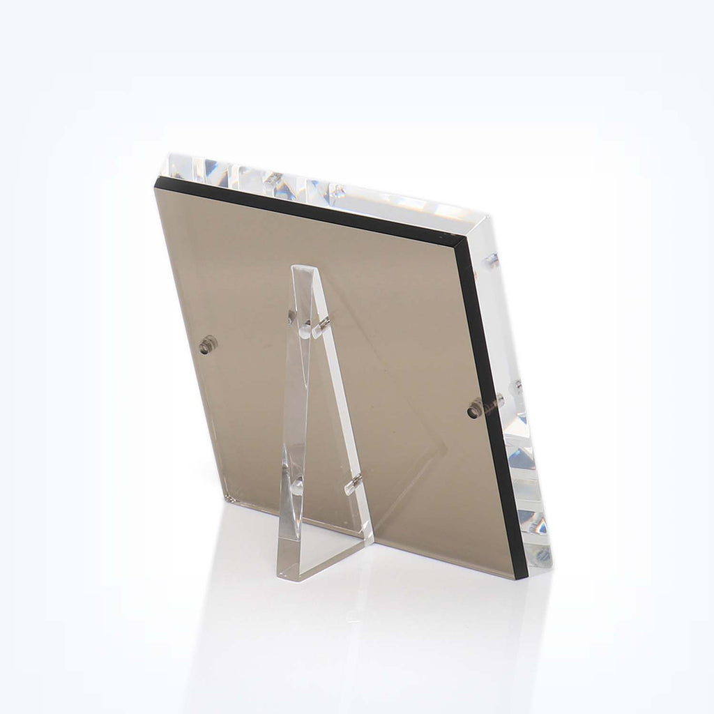 Clear acrylic picture frame with beveled edges and sleek design