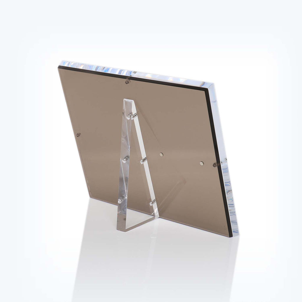 Modern transparent acrylic frame designed for sleek and minimalistic display.
