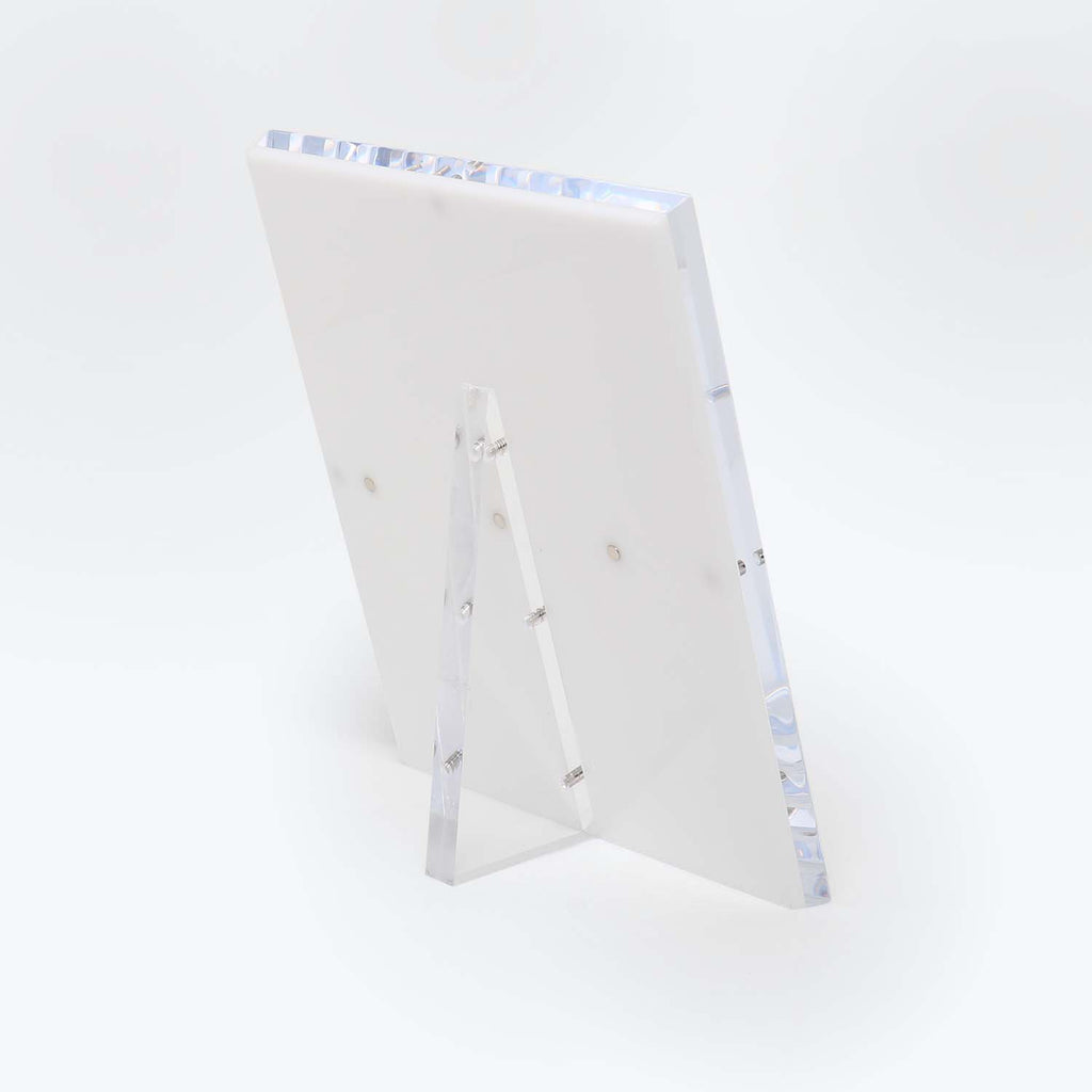 Versatile and sleek acrylic display stand, perfect for showcasing items.