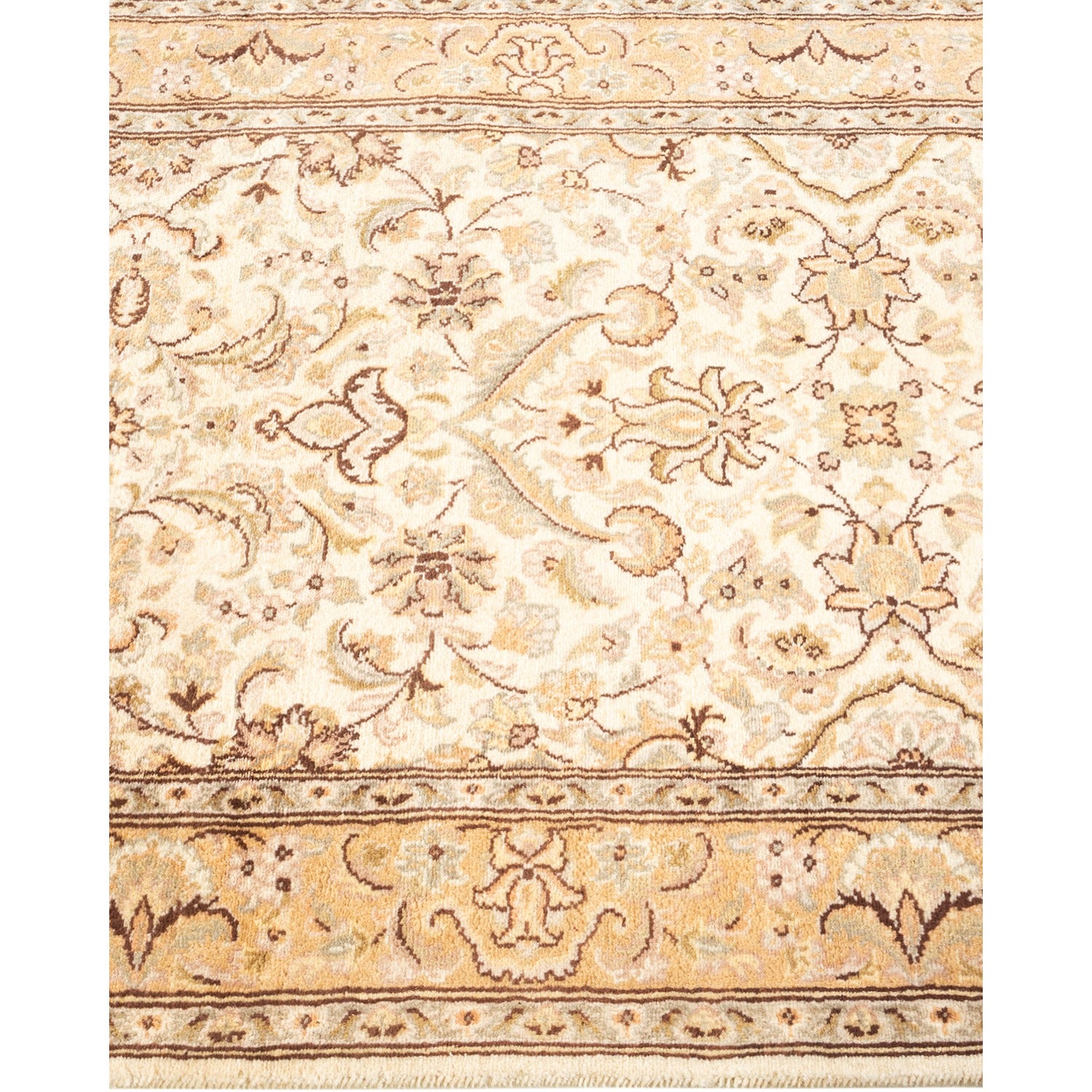 Ornate floral rug in tan, brown, and gold tones.