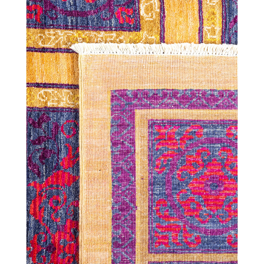 Vibrant textile with intricate patterns and rich colors from traditional origins.