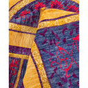 Intricate and vibrant woven fabric with rich tapestry-like design.