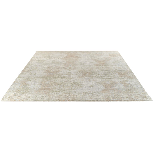 Vintage-inspired rectangular area rug with a faded distressed pattern.